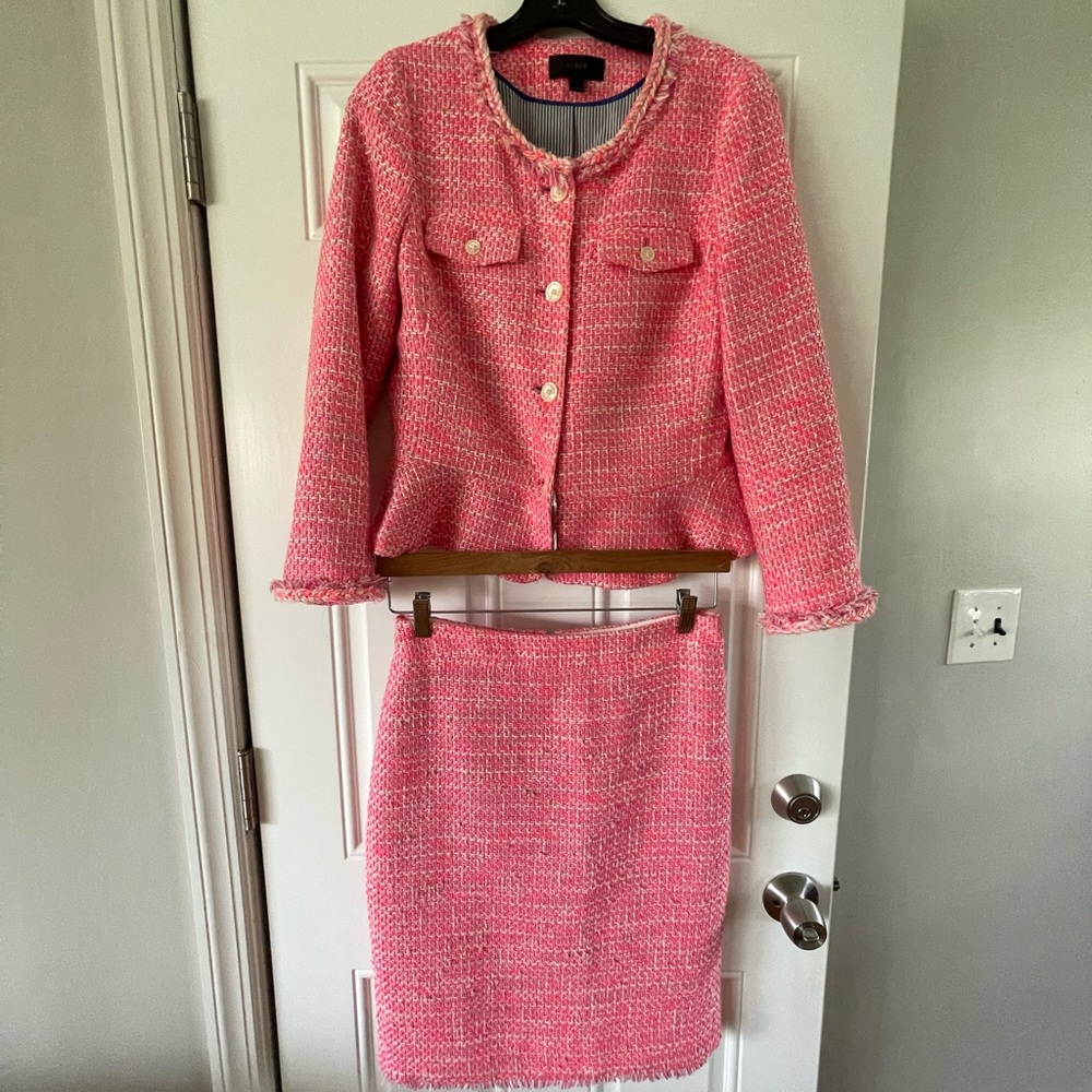 Beautiful detail pink suit. Great condition.